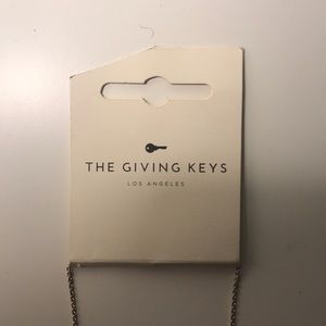 Giving key necklace